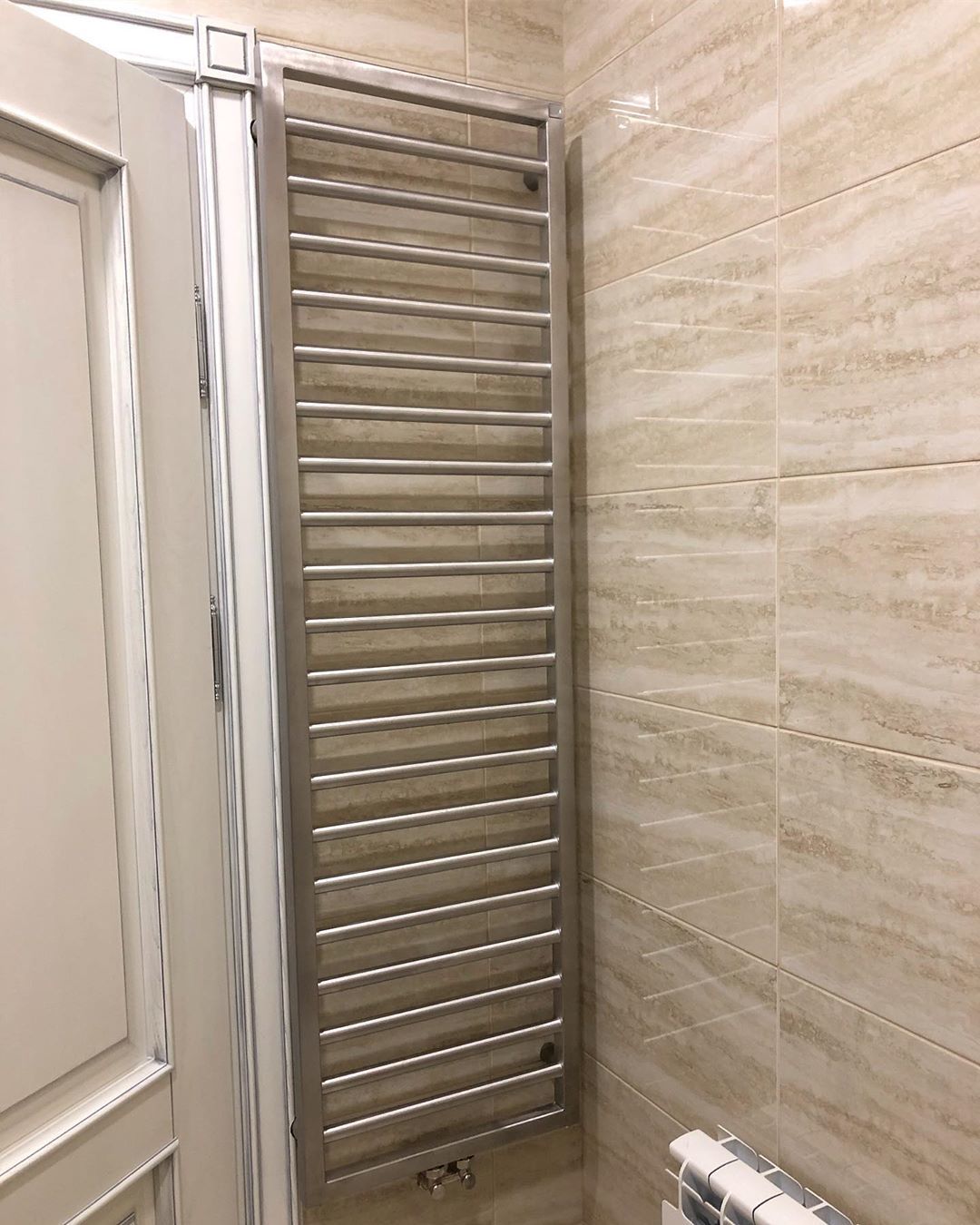 Фото полотенцесушителя Zehnder в интерьере 6